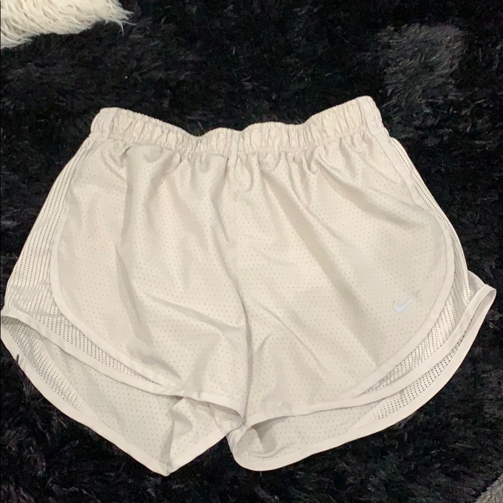 Tan Nike running shorts